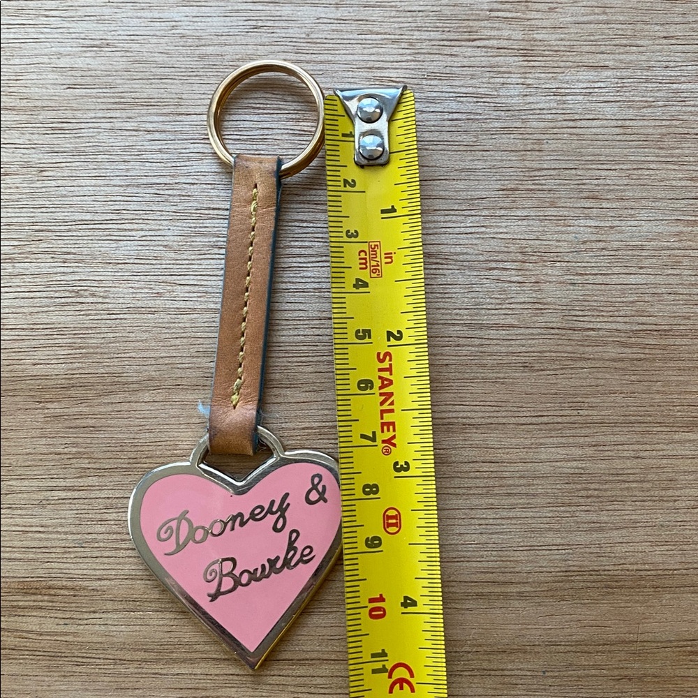 Dooney & Bourke bag charm tan strap gold hardware color in very good condition - Picture 3 of 4